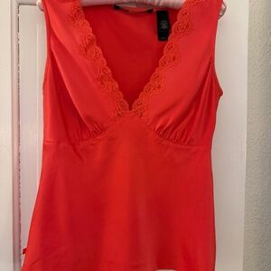 Orange satin and lace sleeveless blouse